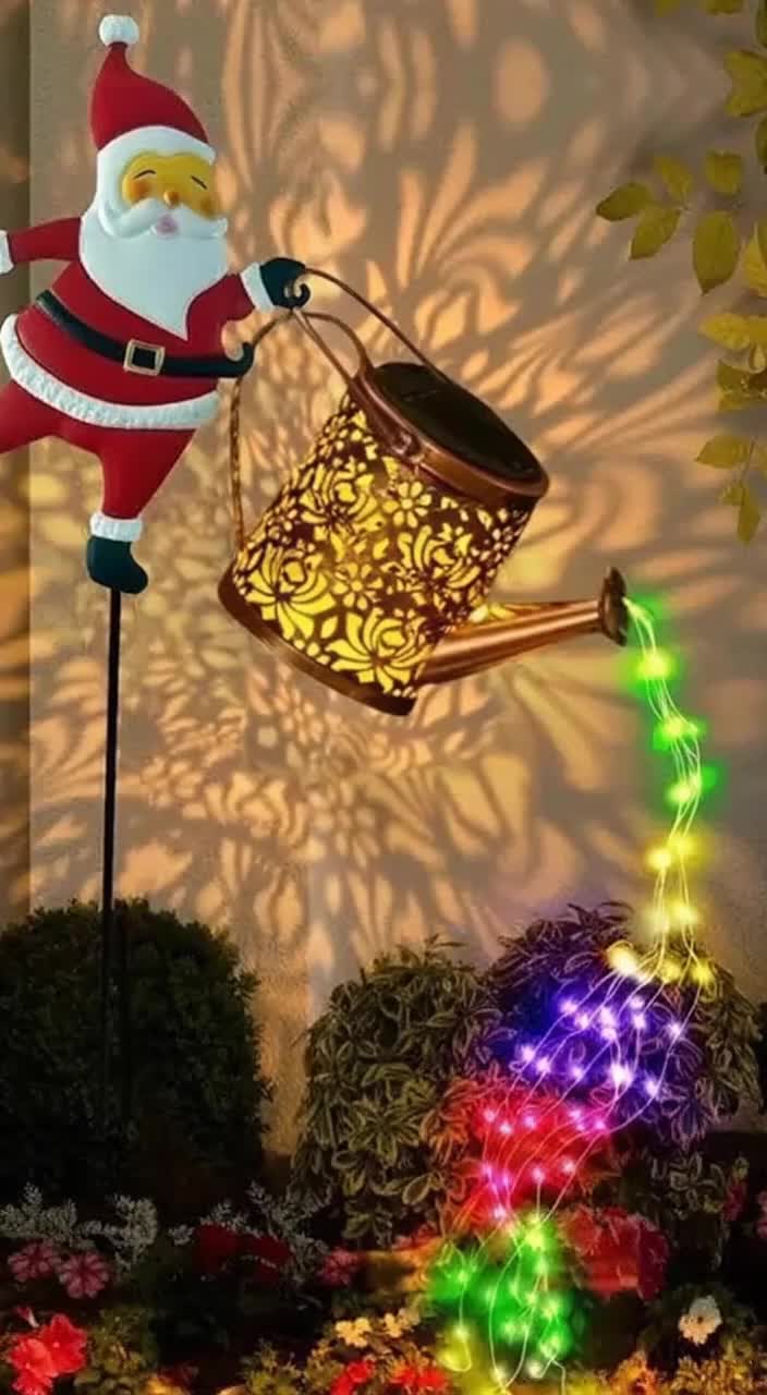 🎅Christmas Garden UPGRADE Alert! This Santa isn’t just cute—he’s pouring a RAINBOW of solar-powered lights into your yard! No cords, no hassle—stick it in your garden and watch it glow magically at night. Your outdoor space will go from “meh” to “WOW, where did you get that?!” in seconds. Be the envy of the neighborhood and turn your home into a Christmas wonderland! ✨  #ChristmasDecor #GardenGoals #TikTokHoliday #SolarLights