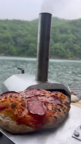 Pizza and a mountain lake. 