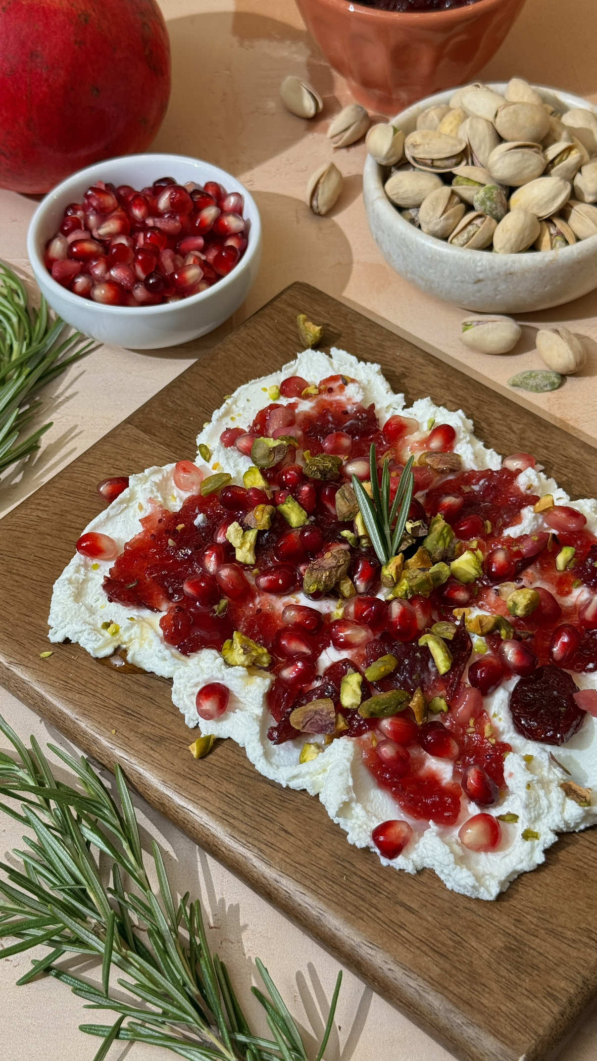 Spread joy this season… preferably with Boar's Head® Chèvre Goat Cheese!  👉 1 package of Boar's Head® Chèvre Goat Cheese 👉 2 tablespoons of cranberry sauce 👉 1 tablespoon of pomegranates 👉 1 tablespoon chopped pistachios 👉 Hot honey, for drizzling 👉 Fresh rosemary, for garnish #BoarsHead #Foodie #Deli #ThanksgivingAppetizer #WhippedGoatCheese 