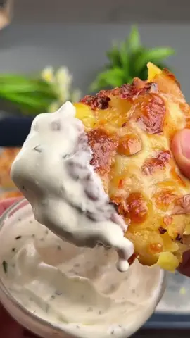 #VNVideoEditor                                           Incredibly delicious baked potatoes with cheese.                                                        I Made the PERFECT Cheesy Baked Potato and Here's How INGREDIENTS: ●Potatoes - 600 g ●Оливковое масло - 2-3 ст.л. ●Сыр моцарелла - 200 г ●Соль - 1 ч.л. ●Хлопья перца - 1 ч.л. 1. Boil the potatoes until tender, about 20-25 minutes for medium-sized potatoes. 2. Cut each potato in half. 3. Line a baking dish with parchment paper. 4. Drizzle with a little vegetable oil, sprinkle with grated cheese, and top with a potato half. 5. Mash the potatoes with a glass, add salt and pepper. 6. Drizzle with a little more vegetable oil and sprinkle with grated cheese. 7. Bake in a preheated oven at 200°C  for 20-22 minutes 8. Serve with your favorite sauce, I have sour cream with herbs. ●It's incredibly delicious and very simple!!!● Bon appetit! The recipe in your language is available in the description, 💖🇺🇦🇵🇱🇩🇪🇺🇸🇫🇰🇪🇸🇵🇹🇮🇹🇷🇴 🇷🇸🇭🇷🇱🇻🇸🇮🇨🇿🇫🇮🇸🇪🇩🇰🇳🇴 🇯🇵 🇬🇷 🇮🇱🇰🇿🇰🇬🇱🇻🇹🇼 🇵🇪 🇦🇷 🇨🇱 🇻🇪 🇹🇭 🇧🇷                           #potato #potatoes #Recipe #simplydeliciousrecipes 