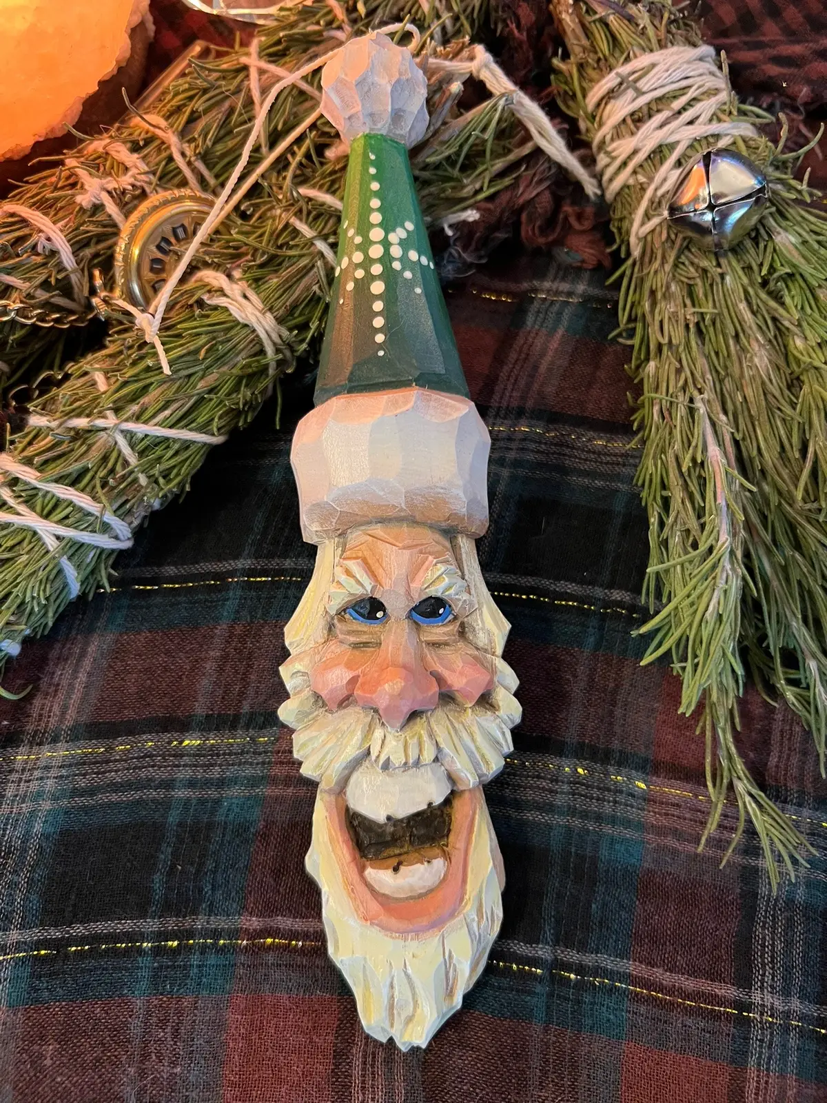 🎄 Old-Fashioned Charm for Your Christmas Tree  ⭐️ Bring the warmth of a country Christmas into your home with our Hand-Carved Santa Ornaments. Each Santa is carefully carved by hand from solid wood, then painted with rich, rustic colors that capture the simple joy of the season. No molds. No machines. Just honest craftsmanship and a love for the holiday spirit! Each ornament tells its own story, with the spirit of the holidays in every carved detail. ✨ Perfect for farmhouse décor, cozy cabins, or anyone who treasures handcrafted beauty. 🎁 Made by hand. Made to last. Made with heart. 🎄Hang a little piece of tradition on your tree this year. 🧑‍🎄 Santa Claus is based on several historical and folkloric figures, mainly Saint Nicholas of Myra, a Christian bishop from the 4th century (in modern-day Turkey). 🌲 Saint Nicholas was famous for his generosity—he secretly gave gifts to the poor and helped children and families in need. Over time, stories about his kindness spread across Europe, and he became the patron saint of children and sailors.  🎄 From Saint Nicholas to Santa Claus In the Netherlands, he was known as Sinterklaas, a kind bishop who arrived on a steamboat from Spain every December 5th to give presents to good children. When Dutch settlers came to America, they brought this tradition with them—Sinterklaas slowly evolved into Santa Claus through English influence and American culture. 🎁 Modern Santa Claus By the 1800s, writers and artists reshaped Santa’s image: “A Visit from St. Nicholas” (1823), better known as “’Twas the Night Before Christmas”, described Santa as a jolly, plump man who flew in a sleigh pulled by reindeer, delivering toys through the chimney. In the late 1800s, cartoonist Thomas Nast drew Santa with a red suit, long white beard, and a workshop at the North Pole. Coca-Cola ads in the 1930s helped cement that cheerful, red-suited Santa we know today. 🦌 The Mythical Details Home: The North Pole, where he lives with Mrs. Claus and an army of elves who make toys. Transportation: A magical sleigh pulled by eight (or nine, with Rudolph) flying reindeer. Powers: Can travel the world in one night, knows who’s naughty or nice, and can slip down chimneys magically. Helpers: Elves make toys, and reindeer power the sleigh. 💫 Symbolism Santa represents: Generosity and kindness The joy of giving The magic of childhood and imagination #santa #christmas #christmasdecor #woodworking #handmade 