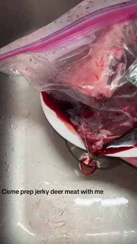 Raw footage of me cutting up deer for the first time they are soaking in the fridge in their seasoning and I will be making more jerky tomorrow!! #fyp #deerjerky ##deer##jerky##contentcreator