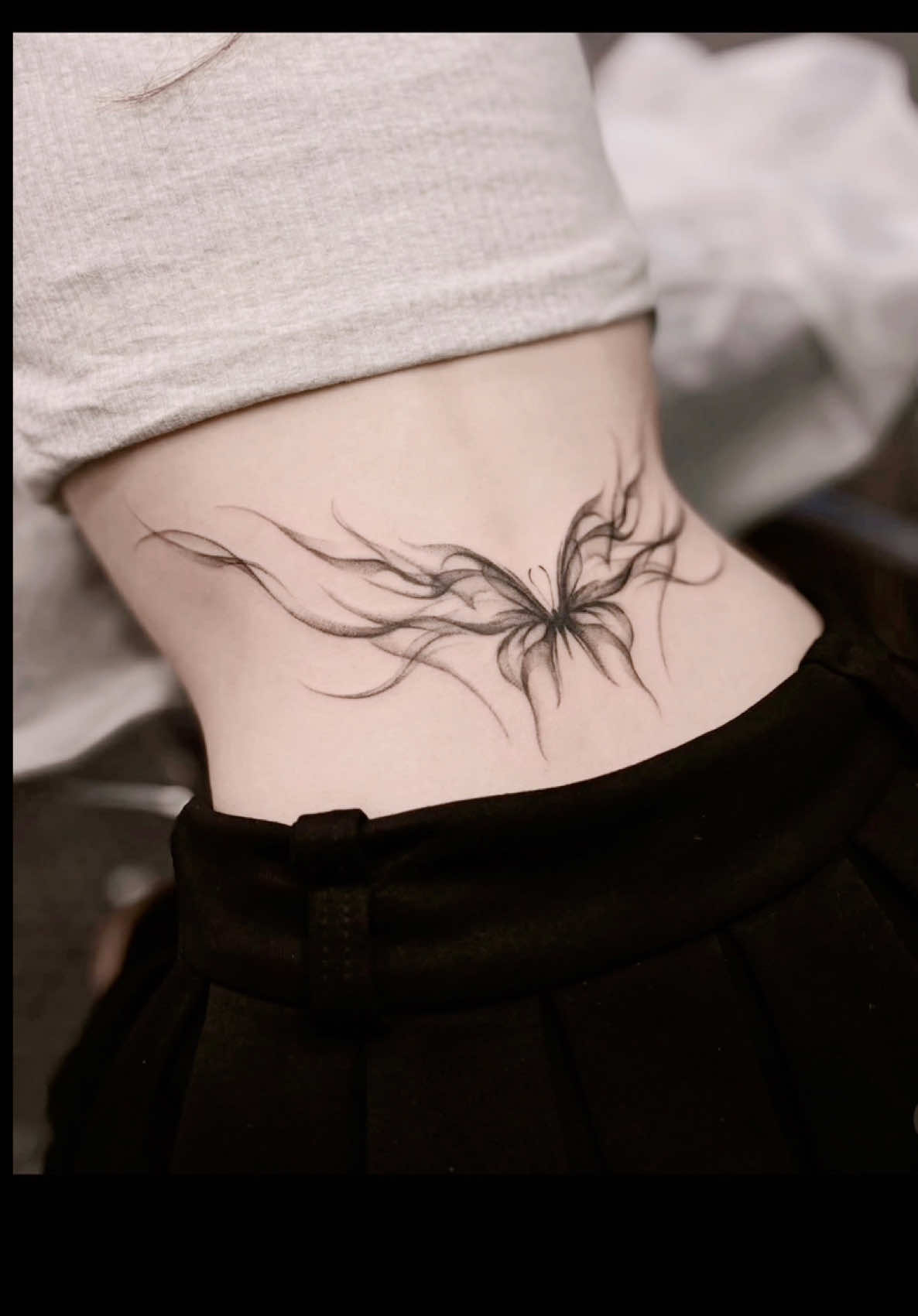 Mẫu xăm bướm khói vị trí thắt lưng 🦋 #namink #tattoo #saigon 