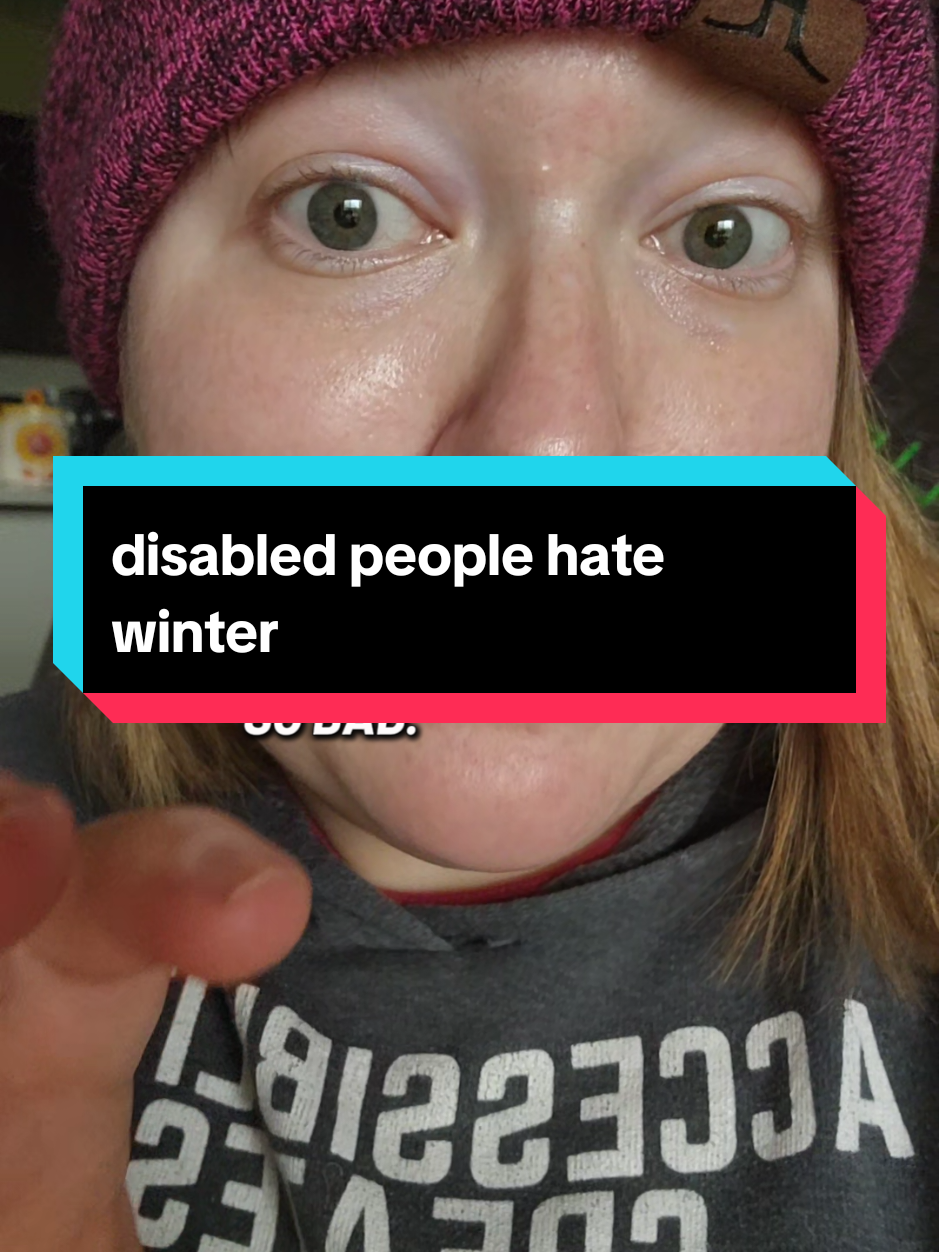 Disabled people hate winter 😒  [Video Description: A video of Erin Founder of Claiming with no makeup and a winter hat with her dog Annie a Boston Terrier in a purple sweatshirt)