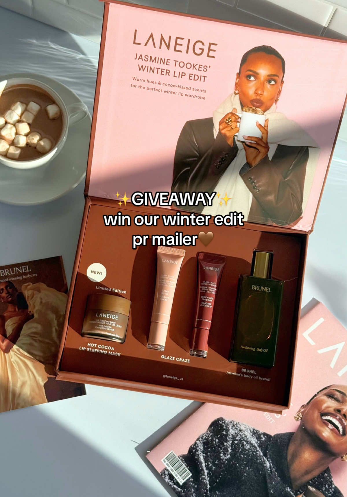 ✨GIVEAWAY TIME!✨ Who wants to win our Winter Edit PR Mailer ft. @Jasmine Tookes for the season? Get your lips ready for the cozy months ahead with our NEW Hot Cocoa Lip Sleeping Mask, Glaze Craze Tinted Lip Serums in Chocolate Frosting & Sugar Glaze, a Body Oil from @Brunel & an exclusive #Laneige Winter Edit catalog! HOW TO ENTER: 🌟 