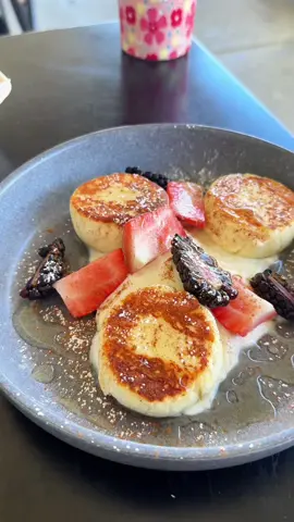 First time trying russian/kyrgyzstan food! @DANIELLE is the ultimate russian queen and food influencer ✨ She always has sirniki ❤️ @Cool_beans was such a cute cafe brunch place, I need their whole honey cake. I couldn’t have asked for better service 🥹👏🏻 #russian #russianfood #sirniki #cottagecheese #cottagecheesepancakes