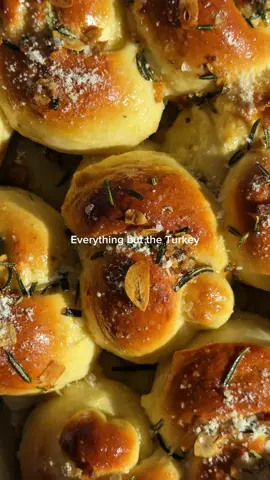 day 1 of everything but the turkey: rosemary garlic knots 🧄🍞🐿️ pull apart layers! crispy garlic! rosemary! crunch! golden perfection! cheese! they have it all!  recipe to come on substack next week 🦦🦦🦦 #everythingbuttheturkey #thanksgivingrecipes #thanksgiving #friendsgiving #garlicknots 