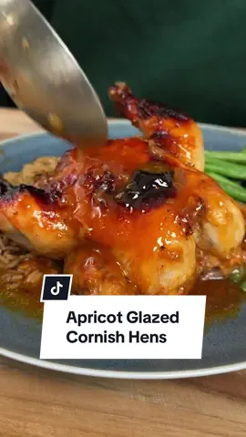 How often do you get the entire bird to yourself on Thanksgiving? 🦃 If you were curious about what Nicole had on her holiday table growing up, it was these Apricot Glazed Cornish Hens. They make a fantastic alternative to turkey, and you'll love the nostalgic flavors! 🧡🍁 Ingredients: 6 Cornish hens 1 cup apricot preserves 1 (1-ounce) packet onion soup mix 1 cup French dressing Directions: Preheat the oven to 400 degrees F (200 degrees C). Lightly grease a large baking dish or roasting pan. Place Cornish hens in the prepared pan.  Stir together preserves, soup mix, and dressing in a bowl until well combined. Pour mixture evenly over hens to fully coat each one.   Bake in the preheated oven for 30 minutes; baste with sauce. Continue to bake until browned on top and juices run clear, 15 to 25 minutes more. Let rest 10 minutes before serving.  Serve topped with remaining sauce from the pan.  🧑‍🍳: Nicole McLaughlin #cornishhens #thanksgiving #turkey #dinner #DinnerIdeas 