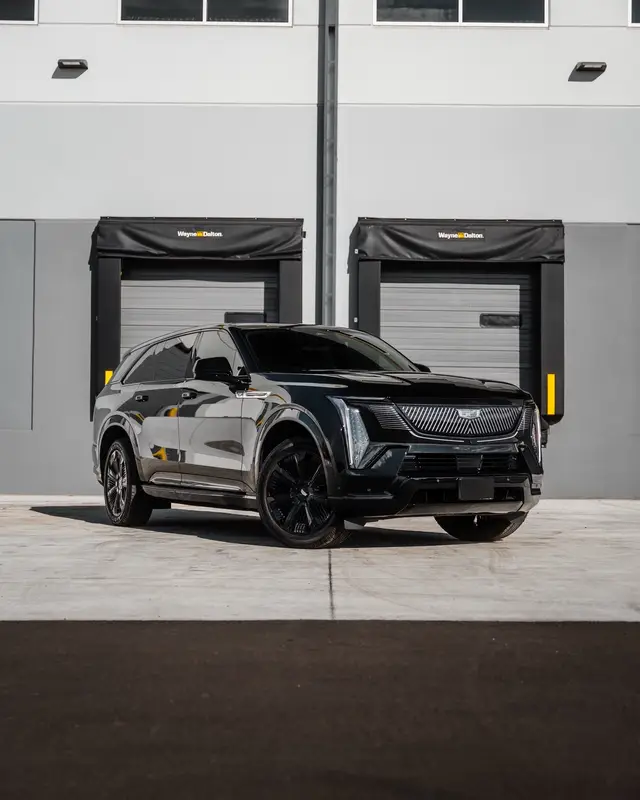 Cadillac Escalade IQ in the shop for a chrome delete, gloss black wheels and the front reflectors smoked out! #cadillac #Escalade #Escaladeiq #ev 