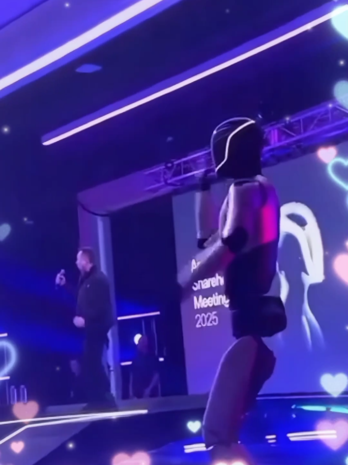 Elon Musk dancing with Optimus! 