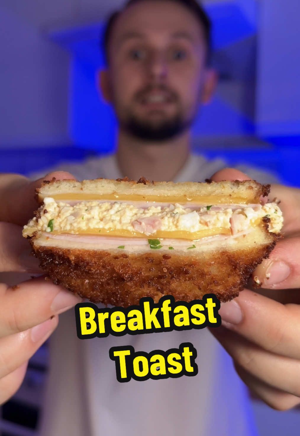 Breakfast ham toast 🔥 Filling: • 3 boiled eggs • 1 tbsp cream cheese • Sriracha sauce – to taste 👌 • Parsley and salt Layer it like this: bread > ham > cheese > filling > ham > cheese > bread. Dip in beaten egg, coat with panko breadcrumbs, and fry for about 30 seconds on each side. Enjoy 😉#Foodie #toast #sandwic #cookingtiktok #recipes 