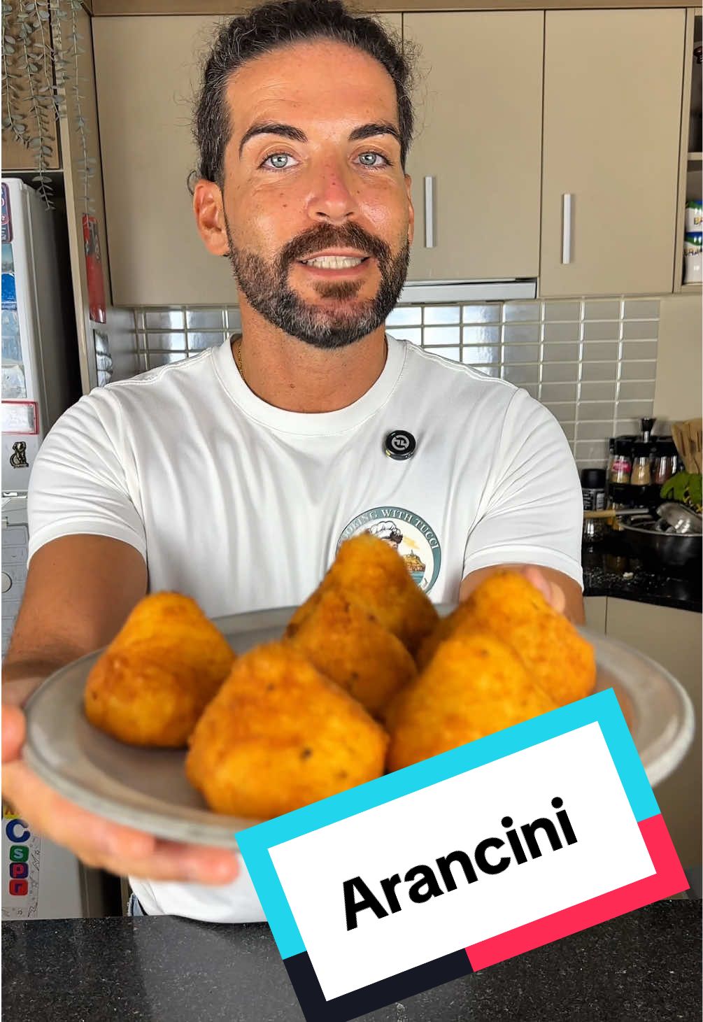 Arancini al Ragù | Crispy, Creamy, and Full of Flavour If you enjoy my recipes and would like to support my channel, you can donate any amount on my Ko-fi page — every gesture helps me keep creating content ❤️ 👉 ko-fi.com/cookingwithtucci Golden, crispy arancini filled with rich ragù and melted cheese — pure comfort with a Sicilian soul and a Neapolitan heart. What I used (10 pcs): • 400g rice • 1L veggie stock • Saffron infused in warm water • 40g butter + 40g Parmigiano • 250g mince • ½ onion, carrot, celery • 400ml passata • ½ glass red wine • 100g mozzarella • Flour, eggs, breadcrumbs, oil for frying How to Make It: Toast rice with butter, cook with stock, and add saffron water. Finish with butter, Parmigiano, and salt — let cool. For the ragù: sauté onion, carrot, celery, add mince, wine, passata, and simmer 40 min. Form rice balls with ragù and mozzarella inside. Coat in flour, egg, breadcrumbs, then fry until golden. Crispy outside, creamy inside — a bite of Italian perfection. Find more Italian street food at 👉 www.cookingwithtucci.com #cookingwithtucci #arancini #italianstreetfood #sicilianfood #italianrecipes
