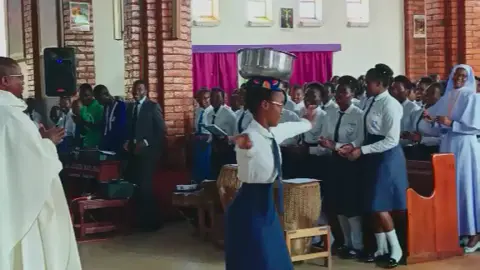 Word Procession during dedication Mass of S. 6 students at St. Aloysius Girls'SS Kitanga.