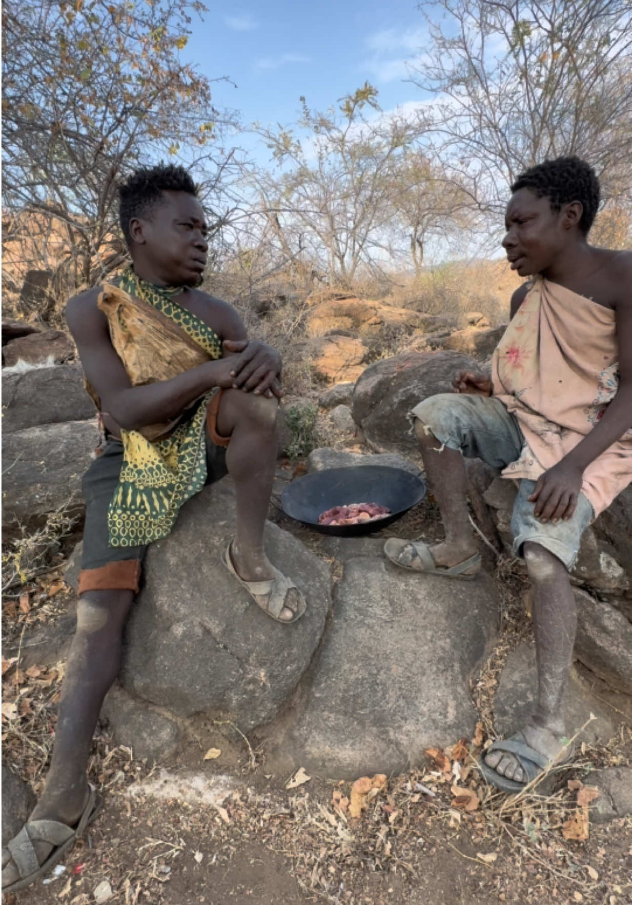 Dudukwe trying hard to convince Chaba to let him cook the meat 😂 but Chaba says, “Who knows, you might run away with the food and eat it all by yourself!” 🤣 Both holding onto the pot full of uncooked meat — neither ready to give up! Hahaha true friendship moments in Hadzabe style 😆🔥 #FoodTok #meatlover #chaba #dudukwe #chabadudukwe 