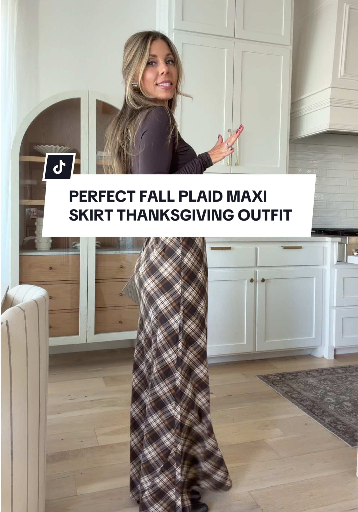 This plaid skirt is just fall and thanksgiving perfection 😍 and the elastic waistband is def ideal if you eat all the things like me!! All in my LTK 🤎 does your family do dressing or stuffing?? We’re dressing all the way!! #thanksgivingoutfit #plaidskirt #fallfashion #falloutfitinspo 