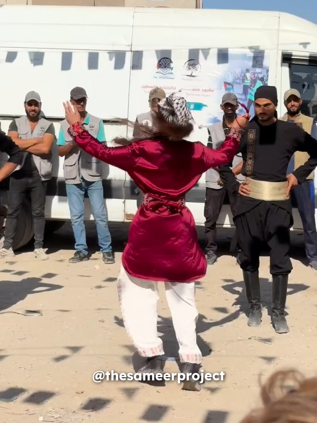 WE WILL REBUILD. Palestinians will always show perseverance against acts of oppression. This is why we started our “Yalla, Na’merha” (let’s build it) initiative, to help families return to their homes. To mark the occasion of clearing out an entire street in the North of Gaza that had been filed with rubble, Translating Falasteen (@translating_falasteen) x The Sameer Project brought a Dabke crew in for the kids and the adults of the neighborhood. Dabke, a traditional Palestinian dance, represents defiance and solidarity as a people. Dabke is also a political statement against oppression. It reaffirms our collective and strong Palestinian identity during a time with the occupation is trying to erase our existence. So, by dancing STRONG and PROUD as PALESTINIANS this is an act of resistance. Help us rebuild, exist on our land, and resist against the occupation. Donate to our campaign in our bio.