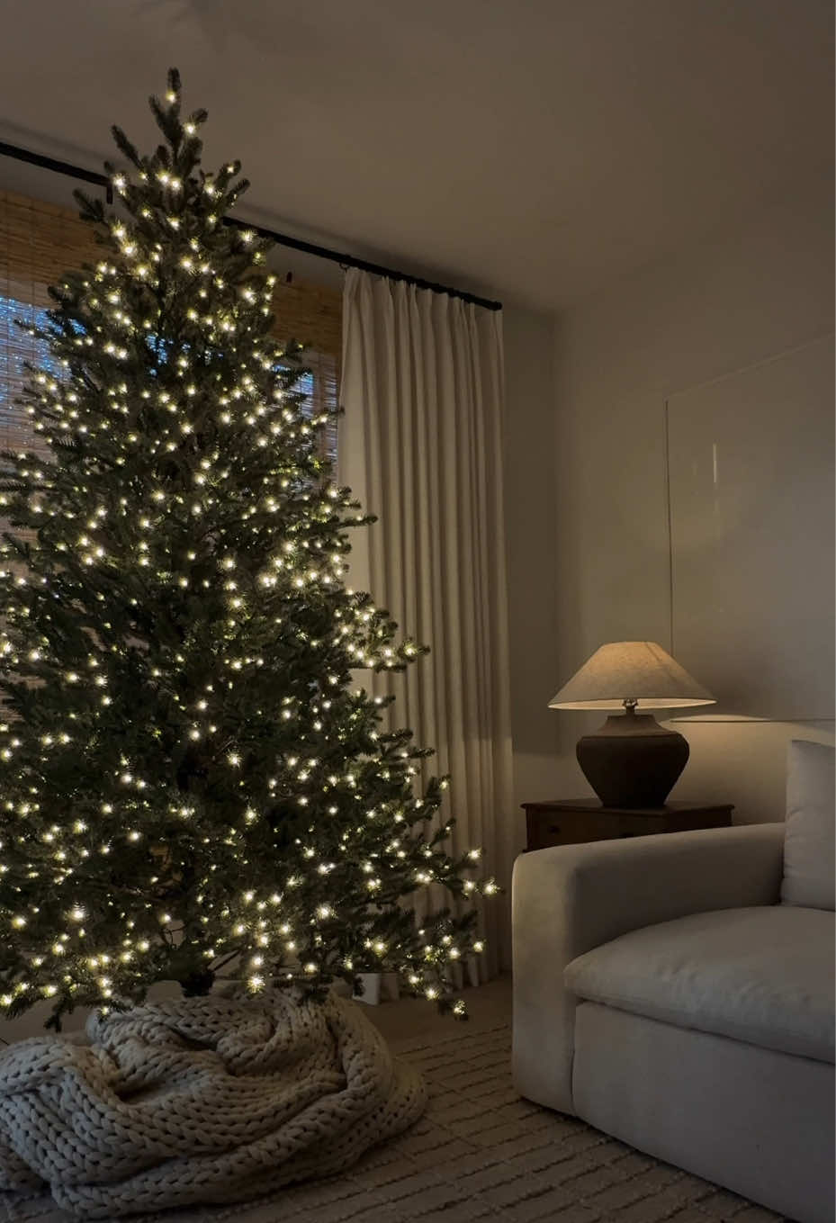 Christmas will be extra cozy this year!♥️ My tree is the 7.5 ft. Elegant Grand Fir from @The Home Depot and I added the Casa Luna blanket from @target as a tree skirt. #christmas #cozylittlechristmas #christmastree #viralchristmastree #christmasdecor 