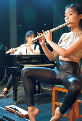 The Asian girl is practicing for the orchestra#Girl #asian #leggings #ai #musica 
