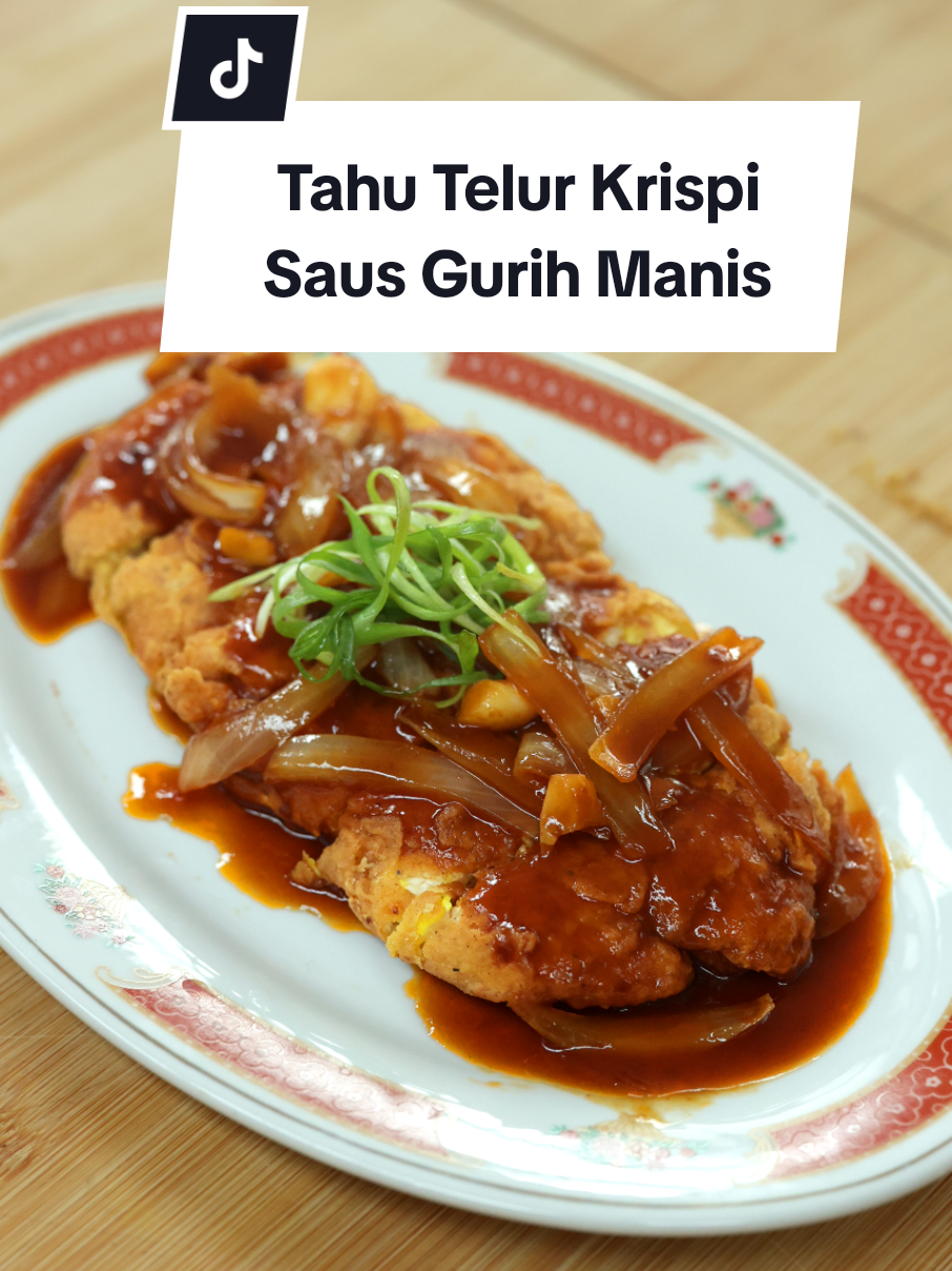 Resep Tahu Telur Krispi Saus Gurih Manis (untuk 3 porsi) Bahan: 3 butir telur 2 buah tahu kuning ¼ sdt garam 1/8 sdt merica minyak untuk menggoreng Bahan pelapis basah: 3 sdm tepung bumbu serbaguna 3 sdm air Bahan pelapis kering: tepung bumbu serbaguna Bahan saus gurih manis: 1 sdm margarin 3 siung bawang putih, geprek ½ buah bawang bombai, iris 1 sdm saus tiram 1 sdm saus sambal 1 sdm saus tomat 1 sdt kecap inggris ½ sdm kecap manis 80 ml air Pelengkap: nasi putih Cara membuat: 1. Di dalam mangkuk, masukkan tahu, garam, merica dan telur, aduk sambil hancurkan tahu 2. Panaskan sedikit minyak, tuang adonan tahu telur dan bentuk kotak atau sesuai selera, masak hingga matang, sisihkan 3. Campurkan tepung bumbu serbaguna dengan air, aduk rata 4. Balurkan tahu telur ke dalam tepung kering, tepung basah lalu ke dalam tepung kering. Goreng hingga kecokelatan, tiriskan 5. Panaskan wajan, masukkan margarin dan bawang putih, tumis sesaat lalu masukkan bawang bombai, tumis hingga wangi 6. Masukkan saus tiram, saus sambal, saus tomat, kecap manis, kecap inggris dan air, masak sesaat 7. Tahu telur krispi saus gurih manis siap disajikan