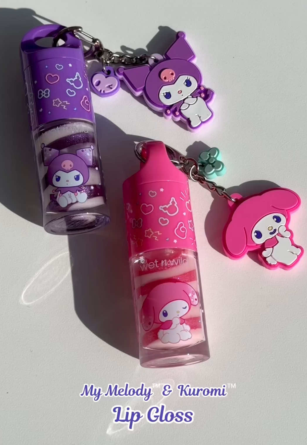 Swirl your shine with the NEW @sanrio My Melody & Kuromi Lip Glosses!🍭 A strawberry-sweet scent, ultra high-shine, and a collectible keychain for that extra touch of attitude 😉✨ Available in 2 totally adorable shades: 🩷 Always Kind 💜 Punk Girl Shop our My Melody & Kuromi collection NOW online & in-store @walmart @ultabeauty @cvspharmacy Coming soon to wetnwildbeauty.com #wetnwildbeauty #mymelody #mymelodynkuromi #kuromi #sanrio 