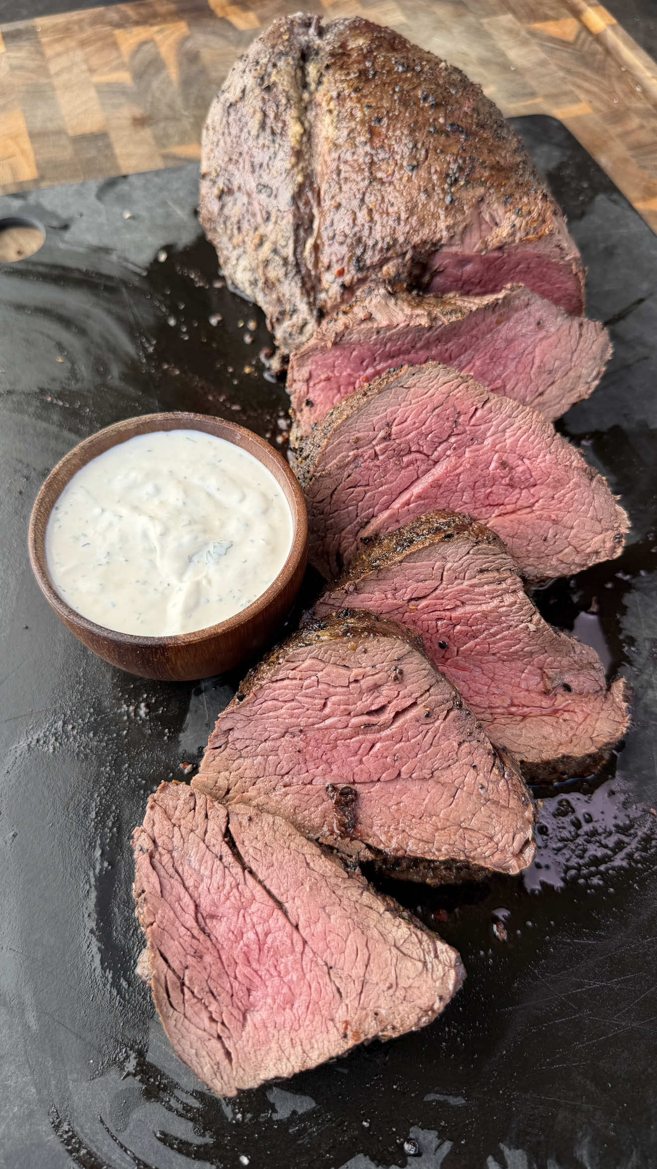 Salt-Baked Beef Tenderloin | Smoked + Charcoal Seared 🥩🔥 Ingredients: 	•	1 whole beef tenderloin (4–6 lbs), trimmed 	•	2 tbsp olive oil or Dijon mustard 	•	Black pepper, to taste 	•	8 cups coarse sea salt 	•	12 egg whites 	•	Fresh rosemary & thyme for the bed 	•	Horseradish sauce: ½ cup sour cream, ¼ cup mayo, 2 tbsp horseradish, 1 tsp Dijon, 1 tsp lemon juice, ½ tsp Worcestershire, salt & pepper Step-by-Step: 1️⃣ Rub beef with oil/Dijon & black pepper. 2️⃣ Mix salt + egg whites to damp sand texture. 3️⃣ Lay salt bed, herbs, then tenderloin on top. 4️⃣ Encapsulate fully with remaining salt. 5️⃣ Smoke at 300°F until 120°F internal. 6️⃣ While smoking, mix horseradish sauce. 7️⃣ Crack salt shell & sear over hot charcoal ~90 sec per side. 8️⃣ Rest 10 min, slice, and serve with sauce.