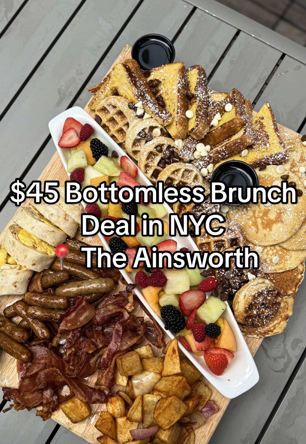 $𝟒𝟓 𝐁𝐨𝐭𝐭𝐨𝐦𝐥𝐞𝐬𝐬 𝐁𝐫𝐮𝐧𝐜𝐡 𝐃𝐞𝐚𝐥 𝐢𝐧 𝐍𝐘𝐂 ⬇️  @theainsworth has one of the best brunch deals in the city. For $45, you get 2 hours of unlimited mimosas, sangrias, and bellinis plus an entrée. You can also upgrade for $10 more to add unlimited classic cocktails. The menu has tons of great breakfast options but my favorites were the Fried Chicken & Biscuits and the Chicken & Waffles Benedict . If you’re coming with a big (and hungry) crew, definitely add the All Out Brunch Board - it’s loaded with every breakfast favorite you can think of. When the weather’s nice, the rooftop is open, but the indoor space is just as great - tons of TVs, making it perfect for game days, birthdays, or weekend brunch with friends. ✨ The Ainsworth is an absolute vibe - great food, great drinks, and great energy. #nyc #nycbrunch #nycdeals #nycbottomlessbrunch #nycbars 