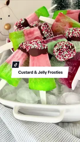 Part 1 of “A Very Easy Aeroplane Christmas” 🎄 Frozen custard and jelly layers, dipped in chocolate and sprinkles. These are pure Christmas fun on a stick! Makes: 12 Ingredients 85g packet Aeroplane Raspberry Jelly 85g packet Aeroplane Lime Jelly 800g vanilla custard (store-bought) Red and green food colouring (optional) 100g dark or milk chocolate, melted Christmas sprinkles, to decorate Method 	1.	In two medium sized bowls make up both packets of Aeroplane Jelly with 250ml boiling water each. Set aside to cool to room temperature. 	2.	Divide the custard evenly into two bowls. Colour one red and one green, if using. 	3.	Spoon the coloured custard between two 6 hole ice cream moulds, filling each about two-thirds full. Place in the freezer while the jelly cools (about 30 minutes). 	4.	Once the jelly has cooled, carefully spoon it over the custard layer. Add sticks and freeze for 6 hours or until completely frozen. 	5.	Once frozen, remove from the moulds and dip into the melted chocolate, then quickly decorate with sprinkles before the chocolate sets. 	6.	Serve immediately, or store in an airtight container in the freezer for up to 1 month. Enjoy ♡  Tips:  - If you only have one set of moulds, make half the quantity or freeze one flavour at a time, allowing about 6 hours to fully set before unmoulding. Overnight is ideal. If making multiple batches with one mould you will need extra sticks, you can buy wooden icey pole sticks or I used disposable spoons and cut the handles off to the required length.  - the easiest way, I find, to get them out of the moulds is to slide a butter knife (not a sharp knife) down each side and then push from the bottom and they should just pop out. You can run it under warm water but I find by the time they release they are starting to melt.  - work quickly with the sprinkles as the chocolate will set quick being added to something frozen.  #VeryEasyChristmas #SweetenTheSeason #AeroplaneJelly #EasyChristmasDessert #ad @Aeroplane Jelly