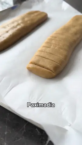 Olive oil biscuit recipe (paximadia) Ingredients 1/2 cup extra virgin olive oil (light) @cobramestate  1/2 cup sugar 1 tablespoon tsikoudia/raki @manousakis_winery  @thegreekprovidore or brandy 1 teaspoon cinnamon 1/2 teaspoon clove Pinch of salt 1/4 cup freshly squeezed orange juice 1/4 teaspoon baking soda 1 teaspoon baking powder 250g plain flour plus extra for kneading, approx 20g Method Place the olive oil, sugar, alcohol, spices and salt in a bowl and mix well until fully incorporated. Combine the orange juice and baking soda, until it fizzes up, then add to the bowl. Combine the flour and the baking powder and mix by hand until you have a soft dough that is easy to shape. You may need a little extra flour to kneed together or to dust the bench with if it’s overly sticky. Divide the dough into two equal parts and shape into logs, about 4 cm in diameter. Place them on the tray and score them into slices with a sharp knife, but not cut right through to the bottom. The dough should still remain in tact as a large piece. Bake at 180 ° C for 20-25 minutes or until the biscuits are a golden color. Let the biscuits cool slightly and then with a sharp knife separate the slices from each other and spread them side by side on the tray and bake them again at 150 ° C for 20-25 minutes or until they become darker in colour and crunchy. Leave the biscuits to cool on the tray. Store in an airtight container. #greek #baking #biscuits #Foodie #Recipe