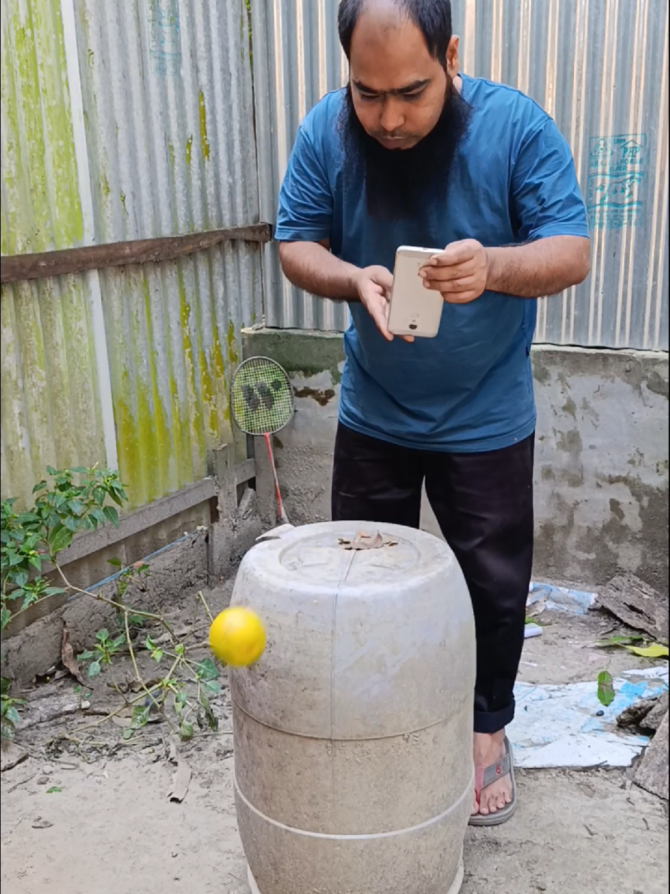 Videography Yellow Orange. I'm making a video with a yellow orange. The orange is smashed on top, it hits a wooden plank, hits the ground, hits the water. #farming #khetibabi #dailyshorts #vairal_video #foryou 