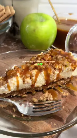 The creamiest apple crumble cheesecake with salted carmel drizzle 🍏🍰 Full recipe:  Ingredients: Crust 	•	18 graham cracker sheets (about 2 cups crumbs) 	•	½ cup (1 stick) salted butter, melted 	•	¼ cup brown sugar Filling 	•	32 oz (4 blocks) cream cheese, softened 	•	4 large eggs 	•	1 cup white sugar 	•	½ cup sour cream  	•	2 tsp vanilla extract or vanilla paste Apple Layer 	•	2 large apples (I used Granny Smith) peeled and diced small 	•	½ lemon, juiced 	•	1 tbsp brown sugar 	•	1 tsp cinnamon 	•	1 tsp cornstarch Crumble Topping 	•	¾ cup all-purpose flour 	•	⅓ cup brown sugar 	•	5 tbsp melted butter 	•	1 tsp vanilla extract 	•	1 tsp cinnamon Caramel Topping 	•	⅓ cup of Carmel dressing  Instructions:  1. Prepare the crust 	1.	Preheat oven to 350°F (175°C). 	2.	Grease a 9-inch springform pan with nonstick spray and line the bottom with parchment paper. 	3.	Crush graham crackers into fine crumbs (food processor or rolling pin). 	4.	Mix crumbs with melted butter and brown sugar until well combined. 	5.	Pour into the pan and press firmly down using the bottom of a glass. 	6.	Bake for 12 minutes, then cool completely on the counter. 	7.	Reduce oven temperature to 325°F (160°C). 2. Prepare the cheesecake filling 	1.	In a large bowl, beat the cream cheese with a hand or stand mixer until smooth. 	2.	Add eggs one at a time, mixing after each until just combined. 	3.	Add sugar, sour cream, and vanilla, then beat until creamy and smooth (1–2 minutes). 	4.	Set aside. 3. Prepare the apples 	1.	In a medium bowl, combine diced apples with lemon juice, brown sugar, cinnamon, and arrowroot. 	2.	Toss until evenly coated. Set aside. 4. Make the crumble 	1.	In another bowl, mix flour and brown sugar. 	2.	Add melted butter, vanilla, and cinnamon. 	3.	Stir until the mixture forms small and medium crumbs (like wet sand with a few larger chunks). 5. Assemble 	1.	If your springform pan leaks, wrap the bottom in several layers of foil. 	2.	Pour the cheesecake filling into the cooled crust. 	3.	Evenly sprinkle the apple mixture over the top (don’t pile it too high in the center). 	4.	Evenly scatter the crumble topping over the apples. 6. Bake 	1.	Bake at 325°F for 30 minutes. 	2.	Without opening the oven, reduce temperature to 250°F and bake another 50 minutes. 	3.	When time is up, turn the oven off and let the cheesecake rest inside for 30 minutes. 	4.	Then crack the oven door open about 2 inches and let it cool in the oven for 1 hour. 7.  Cool & Chill 	1.	Take the cheesecake out and let it reach room temperature on the counter (2–3 hours). 	2.	Run a knife around the edges to loosen. 	3.	Cover and refrigerate overnight to fully set. At least 8 hours  8. Serve 	1.	Before serving, drizzle caramel topping over the top. 	2.	Slice, serve, and enjoy your creamy, apple-crumble masterpiece✨ #apple #cheesecake #bakingrecipe #Foodie #dessert 