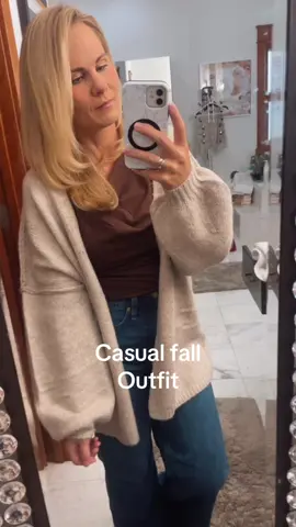 Black Friday deals on this cardigan This combo is the definition of elevated everyday 🍫🤎 This cardigan and chocolate twist top make the perfect cozy-chic pairing — and the J.Crew jean trousers pull it all together with that effortless, polished vibe. 💡 Style tip: Add gold accessories + a neutral tote for that “quiet luxury” look without the price tag. Save this for your next fall outfit formula you’ll want to repeat all season. #LTKFallFashion #AmazonFinds #JCrewStyle #FallOutfitInspo #NeutralStyle     