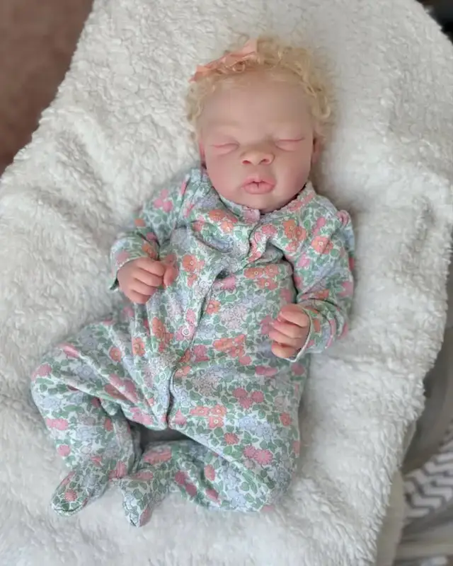 unfortunately I have come into a section to give out my baby doll Rainna out for adoption. as sleep by @Kelli Maple @Sophia silicone reborn babies . please message me if interested