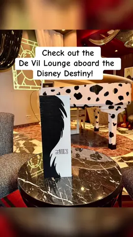 ✨ Step into the De Vil Lounge aboard the Disney Destiny! ✨ The newest ship in the Disney Cruise Line fleet, the Disney Destiny, is all about exploring the dynamic balance of good and evil—and the De Vil Lounge perfectly captures that daring spirit. Inspired by the one and only Cruella de Vil, this chic, fashion-forward lounge features bold black, white, and red décor, luxurious details, and just the right touch of villainous sophistication. Whether you’re sipping on a signature cocktail, enjoying live entertainment, or simply soaking up the stylish atmosphere, this space is a must-visit for adults onboard. 🥂🐾 Stay tuned as I highlight more magical (and mischievous!) spaces on the Disney Destiny—from heroic adventures to elegant escapes. ⚓ Ready to plan your Disney Cruise Line vacation? Let’s get you sailing on your own “Destiny”! 📩 Message me to get started!  #DisneyDestiny #DisneyCruiseLine #CruellaDeVil #DisneyCruiseVacation #DisneyTravelPlanner