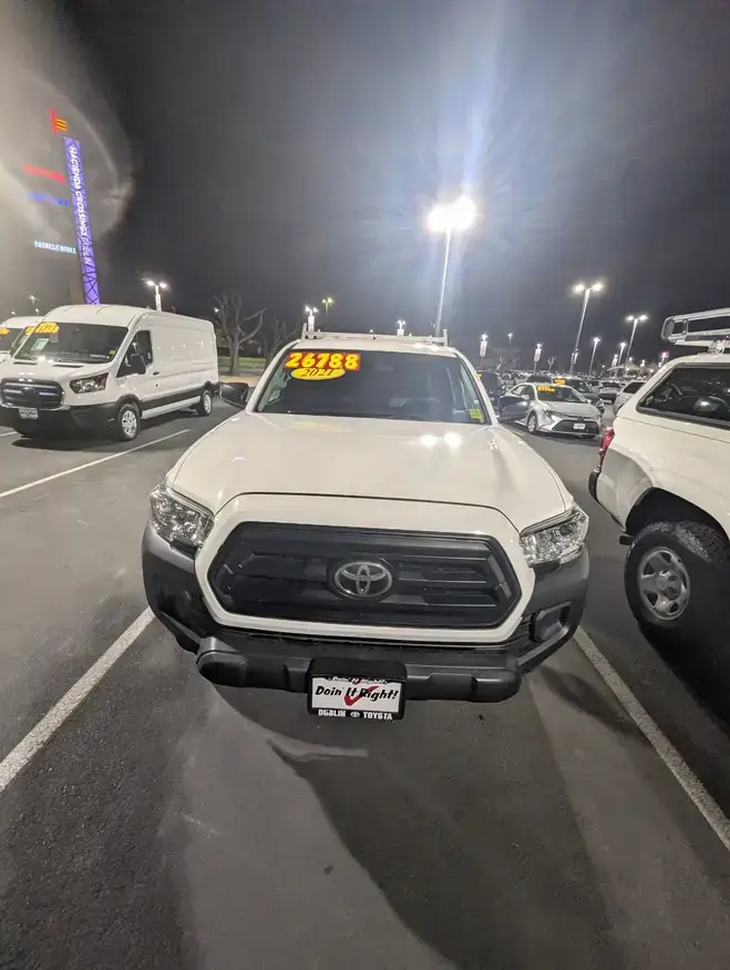 2021 Toyota Tacoma SR Utility Package – Super White Gold Certified • Clean CARFAX • Low Miles ✅ Gold Certified — 7-Year/100,000-Mile Limited Powertrain Warranty for peace of mind ✅ Utility Package — simplified for work use with rear seat, cupholder, and headrest delete ✅ Strong & Capable — 2.7L engine with 4.30 axle ratio and durable 16-in. steel wheels ✅ Modern Tech — Apple CarPlay & Android Auto, backup camera, and Safety Connect ✅ Built Tough — reinforced suspension, body-color bumpers, and black rear step bumper ✅ Well Maintained — low miles and priced to sell fast This Tacoma SR Utility is clean, reliable, and ready to work. HMU if you need it and for inspection thanks