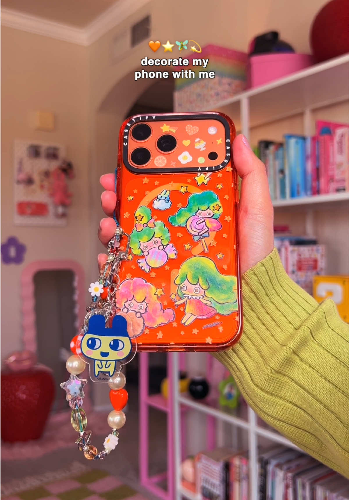 making my phone cuter with little stickers & charms 💗💫 ☁️ casetify phone case designed by nanahoshimuu  ☁️ tamagotchi phone charm from miniso ☁️ stickers from daiso #aesthetic #decorating #iphone17 #iphone17promax #tamagotchi    