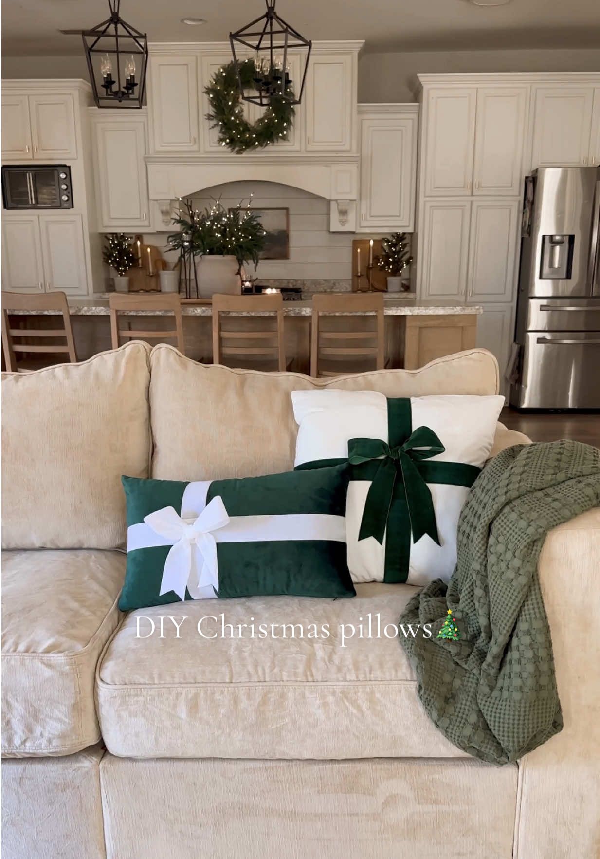 DIY Christmas pillows!🎄 These are no sew method and so easy to make! All you do is glue a piece of wide ribbon around a pillow case and glue on a bow! I used green velvet ribbon and a green velvet pillow case and white velvet ribbon and a white velvet pillow case! So easy and sooo cute for Christmas time! These feel cute and classy!🎄🎄 #christmas #christmasdiy #christmasdecor #diychristmas #christmastime 