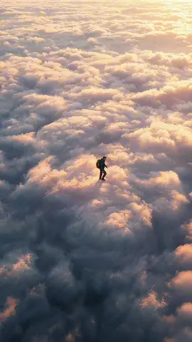 walking on clouds 🌅🌥️ Visuals and production by @echoesofjoonas. AI tools I use: @midjourney, @freepik, @googlegemini, @klingai_official, @magnific_ai, @topazlabs,  #clouds #CinematicReel #AIcinema #AIaesthetic #AIvideo        