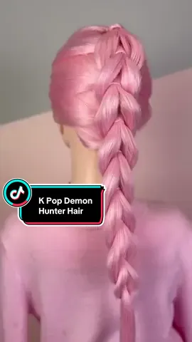 Watch this video to learn how to do a bubble braid. 💓 This has been made popular by the K-pop Demon Hunter movie and is a really easy hairstyle to do.  to create this beautiful hair style, all you need to do is place the hair into five ponytails, split the top one go around the bottom one and secure it into a new elastic - repeat this process all the way down for a beautiful braided ponytail look! #b#braidtokh#hairtokd#demonhuntersb#bubblebraidsh#howtobraid