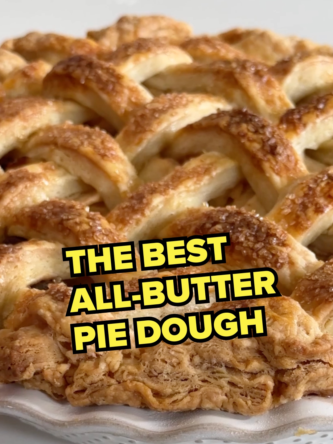 The Best All-Butter Pie Dough is SUPREME (and extra flaky thanks to a clever trick borrowed from croissant-making) 🥧🧈😮 RECIPE 👇 3 1/2 cups all-purpose flour 2 tablespoons sugar 1 1/2 teaspoons kosher salt 3 sticks (1 1/2 cups) cold unsalted butter, cut into pieces and frozen 1/2 cup chilled vodka 2 tablespoons apple cider vinegar 5 tablespoons ice water, plus more if needed Pulse the flour, sugar and salt in a food processor to combine. Add the butter and process until the largest pieces of butter are pea-size. Transfer to a large bowl. Combine the vodka, vinegar and 4 tablespoons of the ice water in a small bowl. Drizzle the wet ingredients over the dough, then mix with a fork until shaggy pieces form. Knead the dough in the bowl with your hands a couple of times until it comes together (it will look quite dry, which is fine). Transfer the large clumps of dough to a work surface. Drizzle 1 tablespoon ice water over any remaining smaller bits of dough in the bowl and knead again to bring it together. If the remaining dough is still too dry to come together, add more ice water in 1-tablespoon increments. Add to the dough on the work surface and press together into a single mass, incorporating any dry bits. Pat the dough into a 1-inch-thick block. Divide the block into 4 pieces with a bench scraper or knife. Stack the pieces on top of one another, tucking any unincorporated dry bits in between the layers. Flatten the dough into a 3/4-inch-thick block. Repeat this process (cutting, stacking and flattening) 3 more times; this creates layers of butter in the dough that produce a wonderfully flaky crust. Divide the dough in half and form into 1-inch-thick discs; wrap each disc tightly in plastic wrap. Refrigerate at least 3 hours and preferably overnight. The dough can be made up to 3 days ahead and refrigerated, or frozen for up to 3 months.
