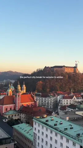 the most underrated city break in Europe, here is everything you can do…🍁🍂🤎 wandering around Ljubljana felt like a fairytale, the old town is beautiful and the Slovenian people are so friendly 🇸🇮❤️ It has everything you want from a weekend city break and it’s the gateway to explore the amazing countryside of Slovenia, here is what you can get up to when you visit 📝  📌 Ljubljana Castle, amazing views and jump on a funicular 🚠  📌 Day trip to the beautiful lake bled 🌊  📌 Other day trips include Predjama Castle Predjamski and Postojna Cave ✨  📌 Explore around Tivoli park  📌 Choose from many rich hot chocolates to try at Cacao 😍  📌 Balkan cuisine at Čevabdžinica Sarajevo '84 and Baščaršija (Ljubljana Trubarjeva) 📌 Wander over the famous bridges, Dragon Bridge & Triple Bridge  📌 Central Market 📌 Nebotičnik for sunset 🌅 #ljubjana #slovenia #sloveniatravel #citybreak #travelinspo 