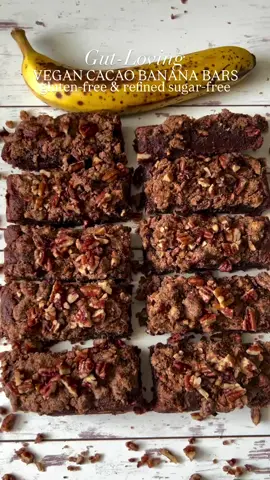 Gut-Loving Vegan Cacao Banana Bars (gluten-free, refined sugar-free, & made with probiotics.) AD Your gut deserves some love, and these bars deliver big time! Think rich cacao, natural sweetness, fiber-packed chia, and probiotics that actually survive and thrive in your gut! 🍌🍫  Why your gut will thank you:  ✔️ Naturally sweet & nourishing  ✔️ Loaded with fiber & omega-3s  ✔️ Probiotic-packed for happy digestion  Fudgy, soft, with the perfect pecan crunch. These bars taste like dessert but work like a gut-health powerhouse. Bake, enjoy, and let your gut feel the love.  Tag us if you try! Who’s making these?!👇🤎 Follow @healthyliciousworld for next-level gluten-free, refined sugar-free treats that taste insane but keep your gut happy!  🥣 Wet Ingredients:  - 1 tbsp chia + 3 tbsp water (gel)  - 3 mashed bananas  - ¼ cup almond milk  - ¼ cup melted coconut oil  - 1 tsp organic vanilla extract  - ¼ cup organic almond butter  🥄 Dry Ingredients:  - ½ cup coconut sugar  - ½ cup cassava flour  - 1½ cups almond flour  - 1 tsp baking soda  - 1 tsp baking powder  - 3 tbsp cacao powder  - ½ tsp real salt  - 3 @justthrivehealth probiotic capsules  🌰 Pecan Topping:  - 1½ cups chopped pecans  - ½ cup + 1 tbsp almond flour  - 2 tsp cinnamon  - ¼ cup maple syrup  - ¼ cup melted coconut oil  - Pinch salt  🔥 Bake:  1️⃣ Preheat oven to 350°F. Line a 9x9 pan with parchment paper. 2️⃣ Mix chia + water, let sit for 5 minutes. 3️⃣ Mash bananas & mix all wet ingredients.  4️⃣ Add dry ingredients & stir. Open probiotic capsules & mix in.  5️⃣ Toss pecan topping ingredients together.  6️⃣ Spread batter in pan, top with pecans.  7️⃣ Bake 40-45 mins. Cool, slice, enjoy!  Ready for a GUTLICIOUS treat? So so good 😋 #guthealthmatters #probiotics #healthydessert #glutenfreedessert #healthybaking #vegandessert  #guthealing #healthybaking #bananabread #refinedsugarfree #glutenfreebaking #cacao 