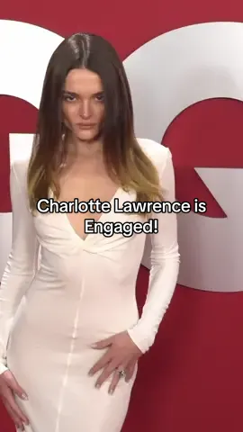 @charlotte lawrence got the ring! The newly engaged singer walked the #GQMOTY party last night in Los Angeles, showing off the ring given to her by fiancé Andrew Watt. 
