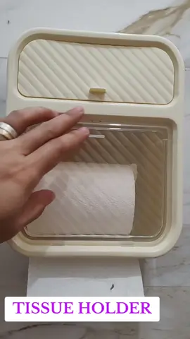 Tissue paper holder with adhesive