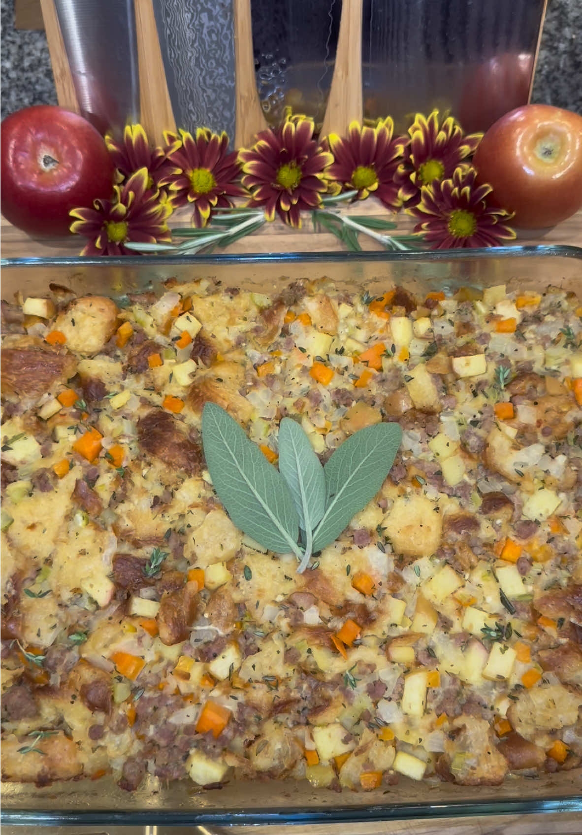 Croissant Sausage & Apple Stuffing🥐🍎 Start out by getting some croissants and rip up them into 1 inch pieces until you have 8 cups worth.  For reference, I used 12 small croissants.  Then add the pieces to a baking sheet and toast them in the oven at 350 degrees for 8 to 10 minutes (or until they’re crispy,) and set them aside.  Then in a pan on medium heat, cook 1 pound of ground Italian sausage.  Then add: -1 medium yellow onion (diced) -1.5 cups of finely diced celery -1 cup of diced carrots Cook until the onions are soft then add: -1 tablespoon of minced garlic  -1 tablespoon of fresh chopped rosemary -1 tablespoon of fresh chopped sage  -1/2 teaspoon of nutmeg  -2 cups of diced apples  -1/3 cup of dry white wine  -season with chicken bouillon, salt and pepper  Cook for about 2 more minutes and then set it aside to cool.  Then in a large mixing bowl add: -2 eggs -1/2 cup of chicken broth  -1 cup of heavy whipping cream  -2 tablespoons of melted butter  -chicken bouillon  Whisk it all together until smooth and then add in your sausage mixture, and all of your croissant pieces. Mix it all together until well combined.  Grease a 9 x 13 baking dish with butter, add in the stuffing, and press it all in.  Bake covered at 375 degrees for 25 to 30 minutes, and then bake uncovered for another 10 to 15 minutes or until it’s golden brown.  Enjoy💜 #food #stuffing #Recipe #recipes 