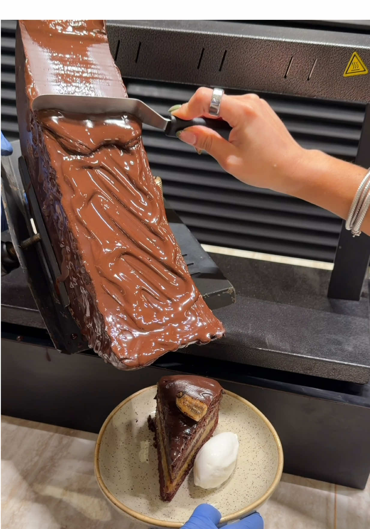 I tried the world’s first CHOCOLATE RACLETTE in Singapore 🍫🇸🇬 Awfully Chocolate is making these 5kg chocolate wheels to melt and pour over desserts inspired by raclette cheese. This chocolate banana cake was a 10/10 and the chocolate cascade was the perfect finishing touch. . . . . — #raclette #chocolatelover #Singapore #singaporefood #chocolates  