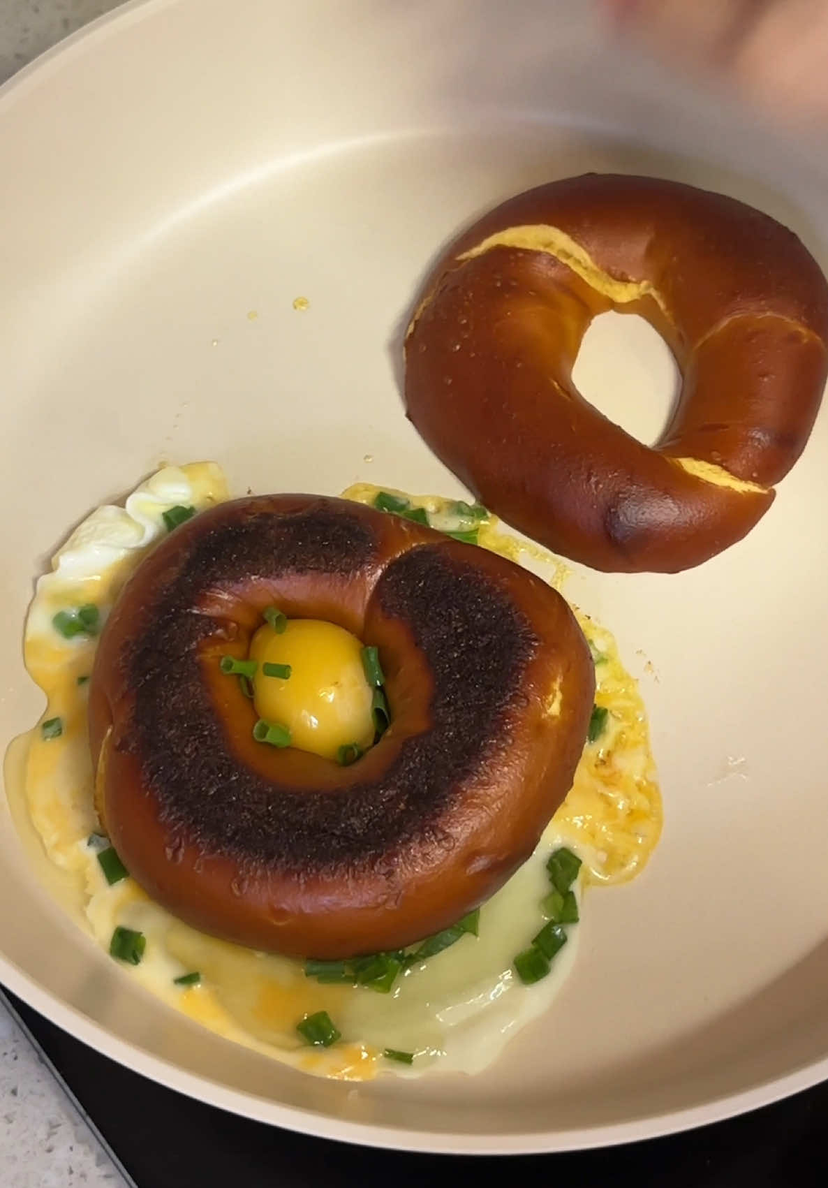 Who knew breakfast could be this good? 🥨🍳🧀 Whipping up a pretzel bun sandwich with cheesy egg and a homemade pumpkin cream cheese. What's your favorite breakfast combo? #fyp #tiktok #viral #foryoupage❤️❤️ #treanding 