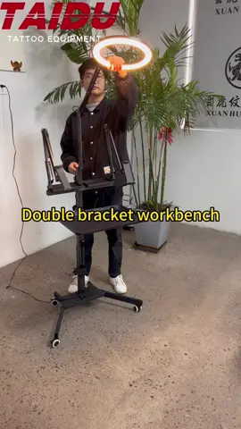 ❤️2025 New Tattoo Workbench with foldable Led light, Magnetic tray,With one bracket,With two mobile phone holders,😃With one foldable Led light,Adjustable steel arm.Your tattoo working reliable assistant.👍#taidu #tattoo #tattoofactory #tattoofurniture #tattooartist #tattoosupplies #tattoostudio #beautystudio #tattoowork #tattooideas #tattoomachine #tattoolove #EUwarehouse #USwarehouse #beauty #tattoolovers 