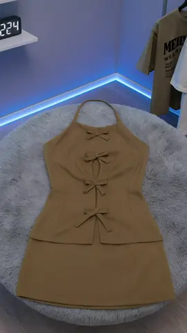 A chic khaki halter dress featuring elegant bow details and a modern, minimalist vibe perfect for stylish flat-lay showcases. #FashionFlatlay #ChicStyle #OOTDReady #AestheticVibes #DressInFocus