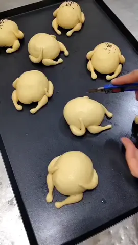 Cryspy Chicken Bread 🥰 dough preparation in the mixer bowl  bread flour 400g sugar 20g salt 6g instant dry yeast 6g stir well water 240ml knead the dough for 4min butter 30g knead the dough for 7min cover the dough rest the dough for 20min separate the dough into 80g each piece for small pieces 6g dough make balls  cover the dough rest the dough for 10min make the bread roll the dough boiled chicken meat piece of gouda cheese  or use grated cheese your choice  make the chicken legs make the chicken hands  cover the dough  rest the dough for 30min take a big bowl  water 1400ml baking soda 70g put the bread in the water  for 20 seconds  put it back in the baking sheet cut the bread on the top sesame seeds  Bake in a preheated oven 220C for 15min depends on the oven brush with melted butter #bread #chicken #Recipe #fyp 