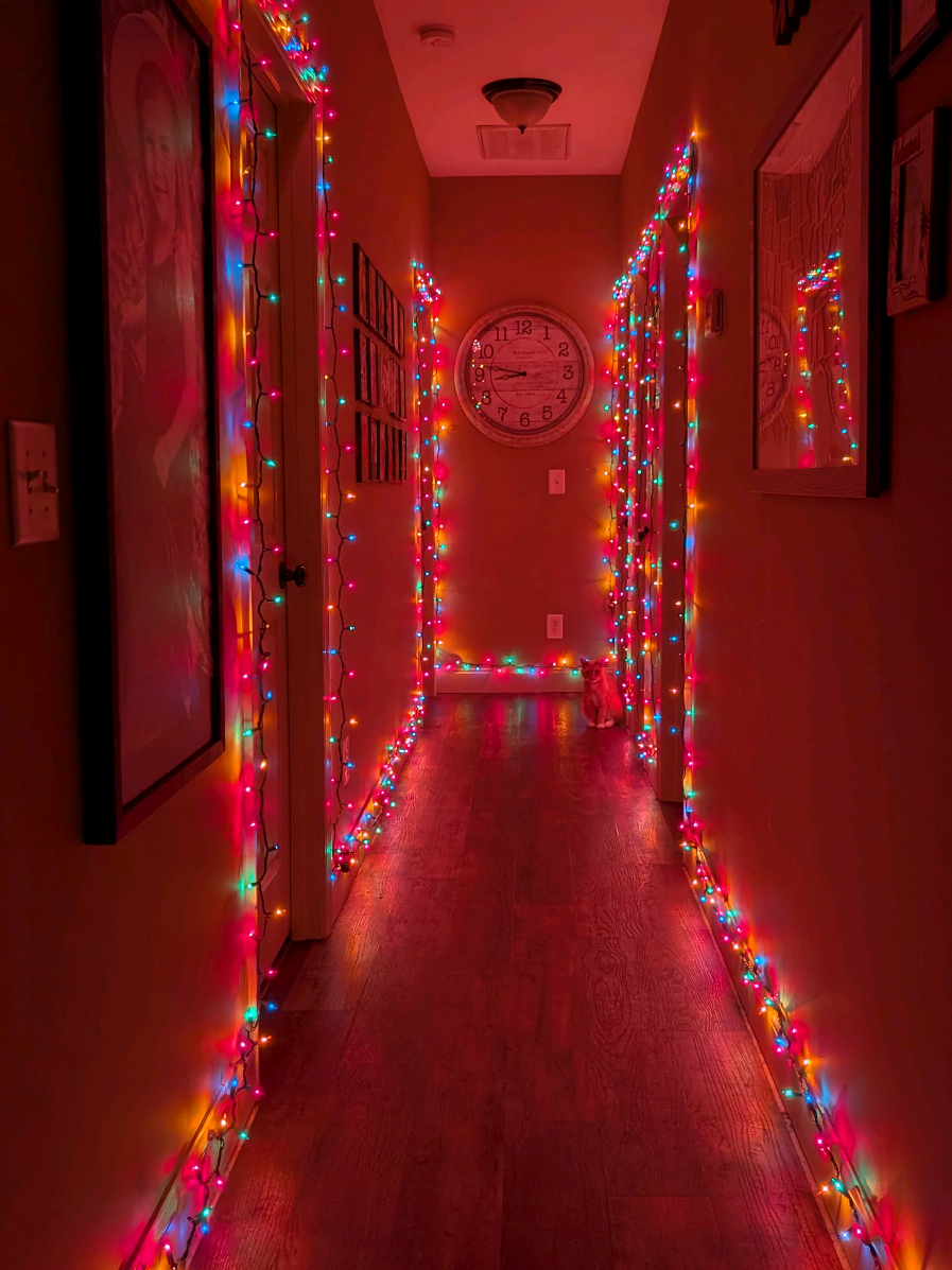 run to Walmart & buy the incandescent colorful lights & command strips to make your hallway look like this 😍 my family loves it! 💚❤️ #christmas #vintagechristmas #christmaslights #christmasdecor #diychristmas 